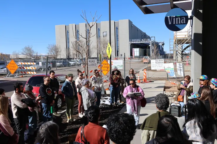 With a new data center in the background, residents of the Swansea neighborhood of Denver and others shared grievances at a March 7 rally. Photo/Allen Best